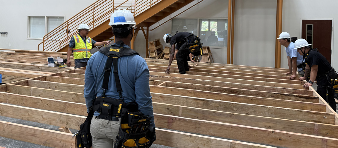 UBC MVP Hawaii participants practice construction skills at the training center.